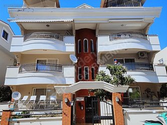 Marmaris Çamdibi Mahallesinde 3 cepheli bahçe katı daire
