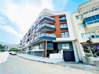 Kuşadası Davutlarda Kapalı Otoparklı Ön Cephe 2+1 Daire