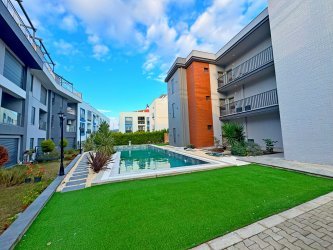 DAVUTLAR MERKEZDE HAVUZLU GÜVENLİKLİ SİTEDE ÖN CEPHE 1+1 RESİDENCE DAİRE