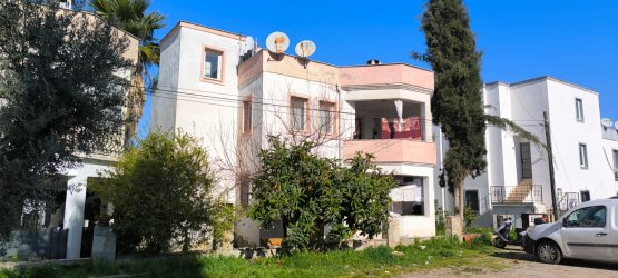 BODRUM TURGUTREİS MERKEZDE  DENİZE YAKIN KOMPLE SATILIK BİNA  REF-3117