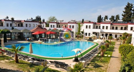 NAZAR EMLAK`TAN  BODRUM TURGUTREİS  MERKEZDE  1+1 DAİRE REF--3308.