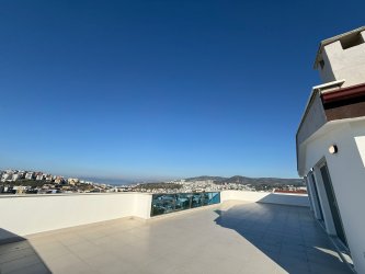 KUŞADASI HARİKA DENİZ VE ŞEHİR MANZARALI  470+30M2. 4+1 DUBLEKS