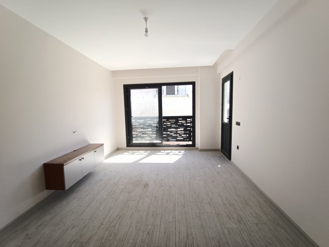 GÜRMES EMLAKTAN KUŞADASI MERKEZDE YENİ YAPI SIFIR 2+1 DAİRE 