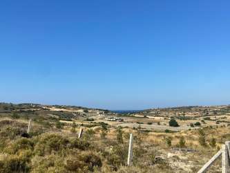 ÇEŞME ALTINKUM DA SATILIK KISMİ DENİZ MANZARALI 11.566 m2 ARSA