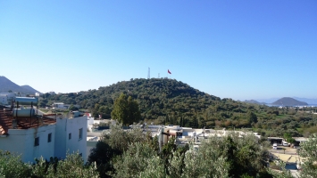 BODRUM NAZAR EMLAK`TAN TURGUTREİS`TE İMARA YAKIN TARLA REF-1386