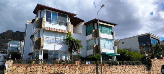 SATILIK DAİRE - BODRUM TURGUTREİS MERKEZDE DENİZE MANZARALI 2+1 DAİRE - REF- 3241
