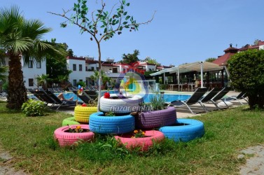 NAZAR EMLAK`TAN  BODRUM TURGUTREİS  MERKEZDE  1+1 DAİRE REF--3308