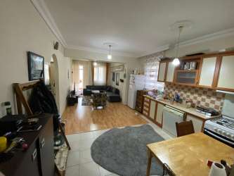 ANTALYA KONYAALTI GÜRSU`DA HAVUZLU DENİZE YAKIN SİTE İÇİNDE ARA KAT 2+1 SATILIK DAİRE