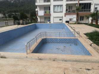 ANTALYA KONYAALTI SARISUDA HAVUZLU SİTEDE  3+1  SATILIK ARAKAT DAİRE