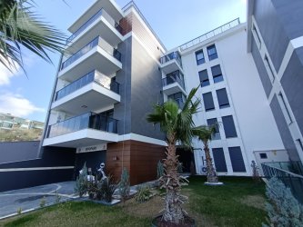 GÜRMES EMLAKTAN KUŞADASI DEĞİRMENDEREDE DENİZ MANZARALI SATILIK 2+1 YENİ DAİRE 