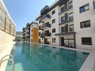KUŞADASI YENİ PROJE SATILIK  1+1 DAİRE