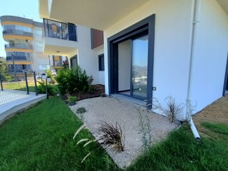 GÜRMES EMLAKTAN DEĞİRMENDERE`DE SATILIK YENİ BAHÇELİ 2+1 DAİRE  