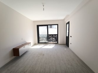 GÜRMES EMLAKTAN KUŞADASI MERKEZDE YENİ YAPI SIFIR 2+1 DAİRE 