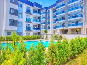 GÜRMES EMLAKTAN KUŞADASINDA SATILIK EŞYALI ARA KAT 1+1 DAİRE