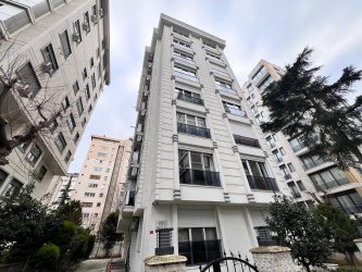 KADIKÖY ERENKÖYDE MARMARAYA YAKIN 2+1 SATILIK DAİRE TROYKADAN